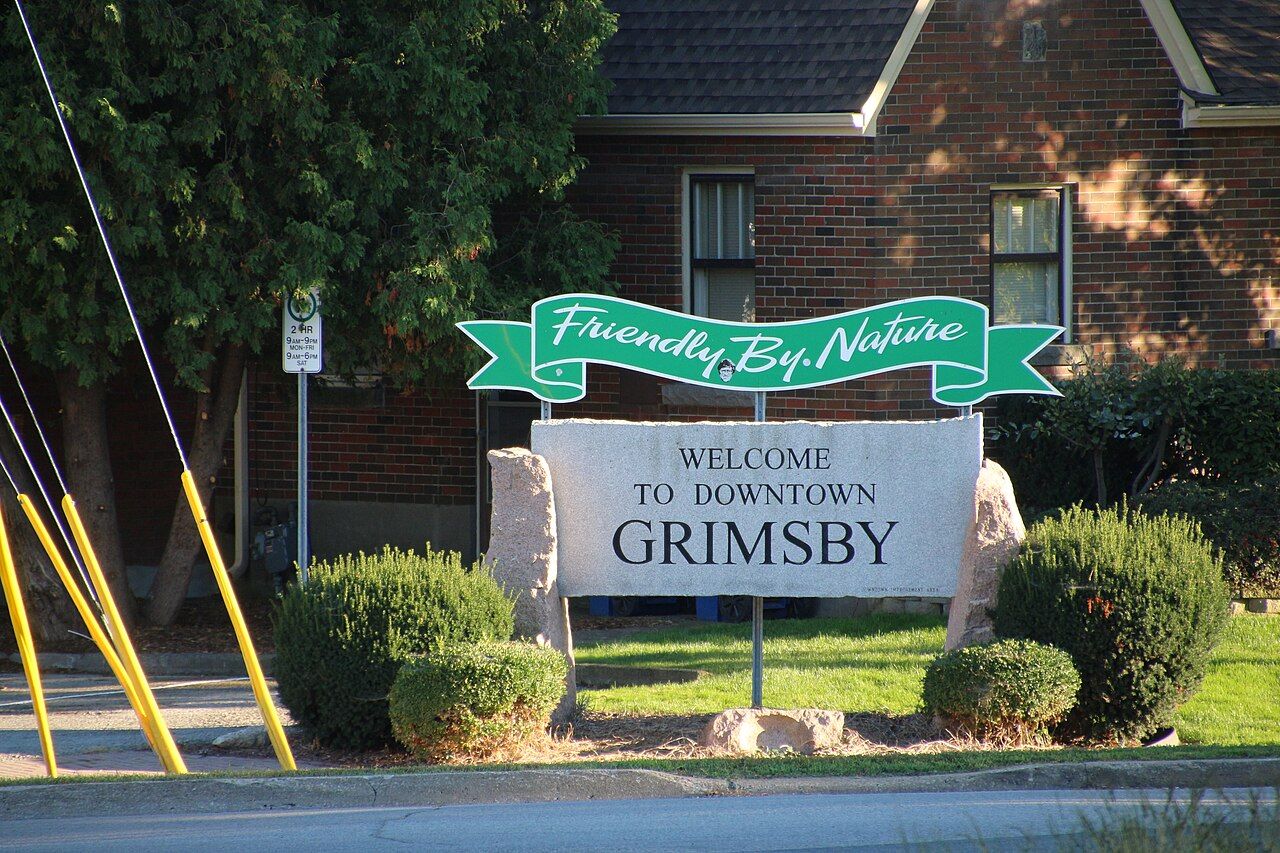 Welcome to Grimsby sign in the Niagara fruit belt; Van Blanc delivers sea cans to Grimsby farms and lakeside properties.