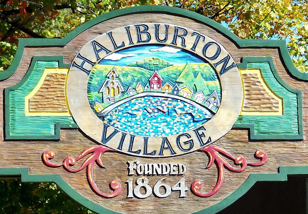 Haliburton Village sign in cottage country; Van Blanc hauls shipping containers into the Haliburton Highlands.