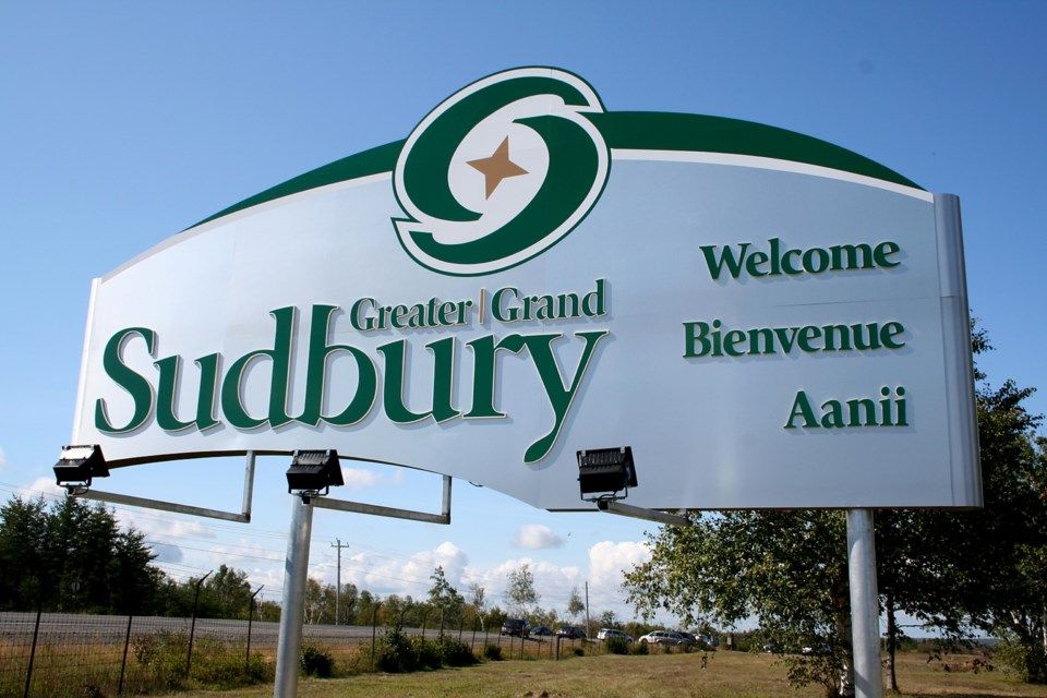 Greater Sudbury city sign in Northern Ontario; Van Blanc freights shipping containers to Sudbury mining and industrial sites.