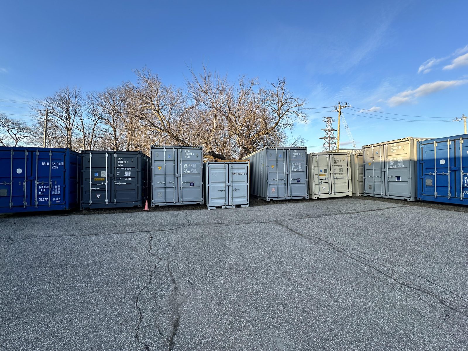 Rows of shipping containers in assorted sizes at the Van Blanc yard in Brantford, the buy-instead-of-rent alternative to PODS and CubeIT