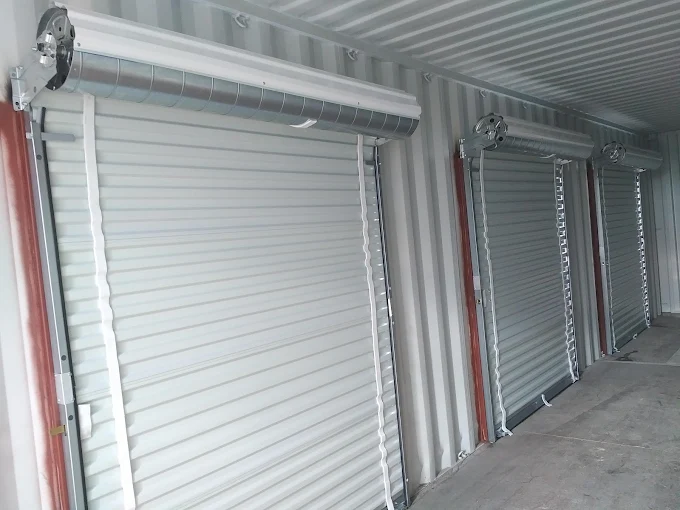 Interior of a container fitted with a roll-up door, the sealable envelope a controlled drying room needs.