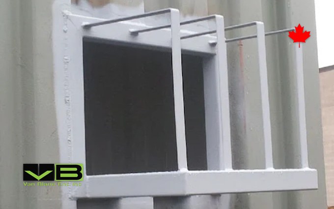 Security bars welded across a framed window opening and painted white.