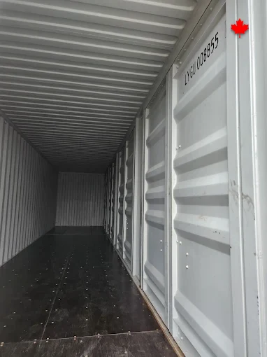 Looking into an empty container interior, floor swept and ready for loading