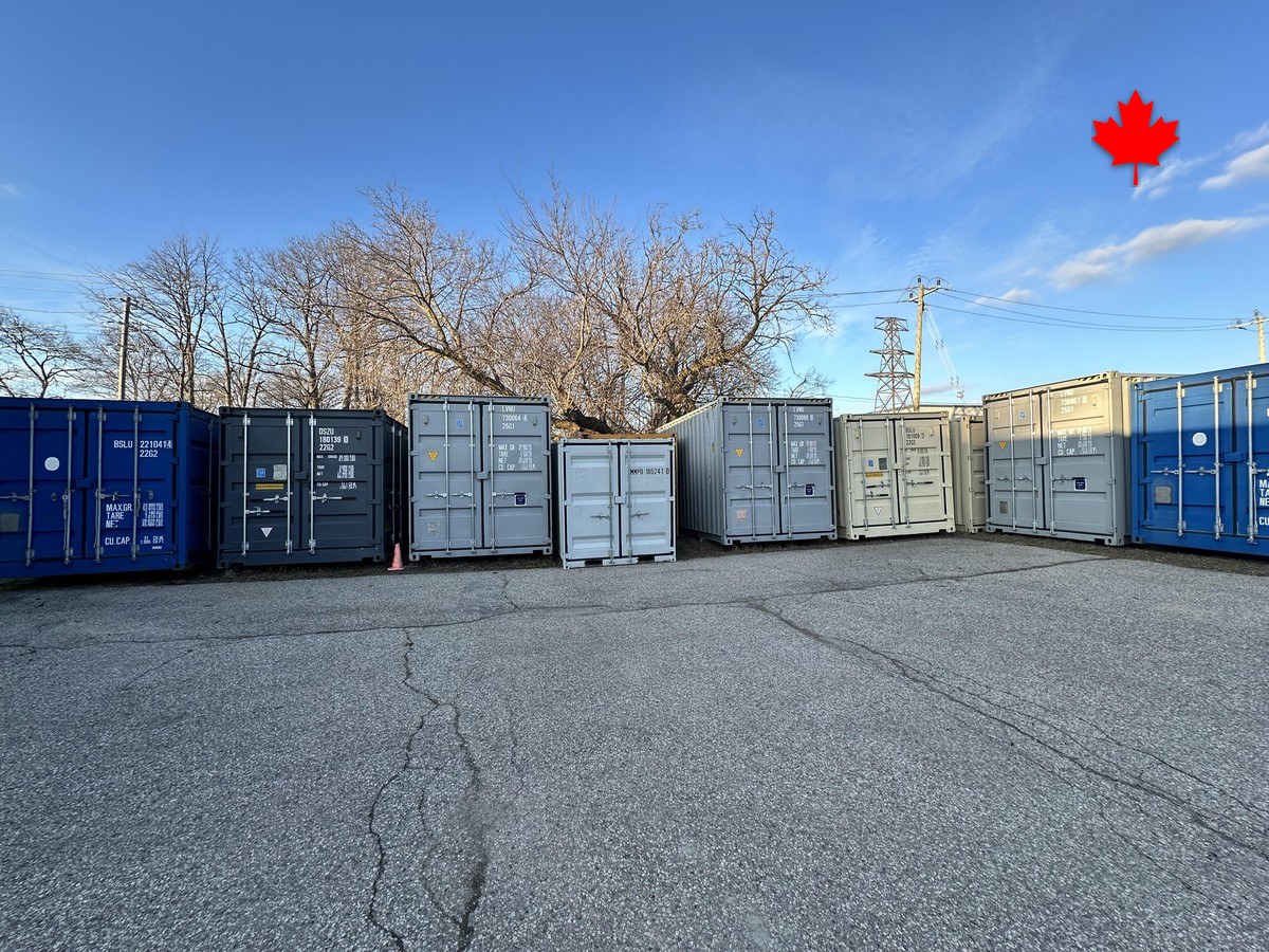 Rows of mixed-grade containers waiting in the Van Blanc yard