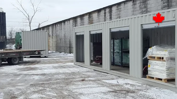 Storage containers lined up in the yard awaiting their next delivery