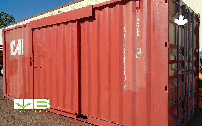A used red 20-foot shipping container parked on the gravel at the Brantford yard, doors closed